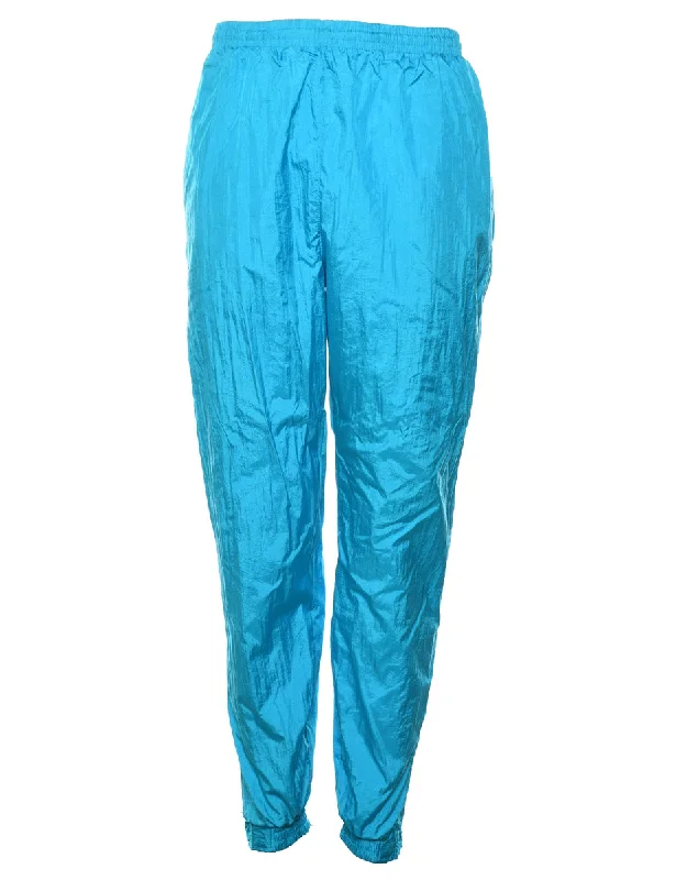 Midnight Madness sporty jacketAqua Blue 1980s Track Pants - W30 L31